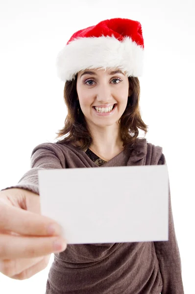 Christmas woman holding business card — Stock Photo, Image