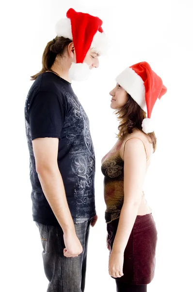 Chrisatmas couple looking at each other — Stock Photo, Image