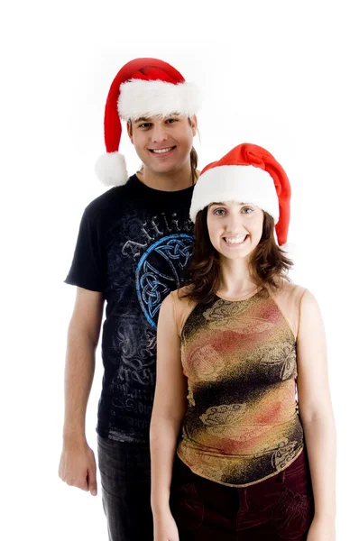 Νεαρό ζευγάρι φορώντας καπέλο Χριστούγεννα — Φωτογραφία Αρχείου