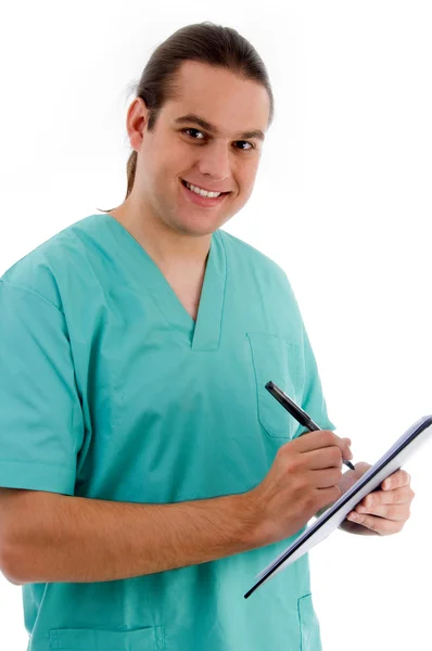 Médico masculino com caderno de prescrição — Fotografia de Stock