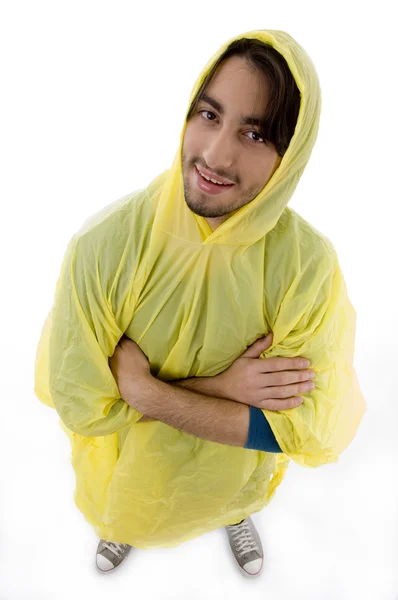 Hög vinkel syn på mannen som bär regnrock — Stockfoto
