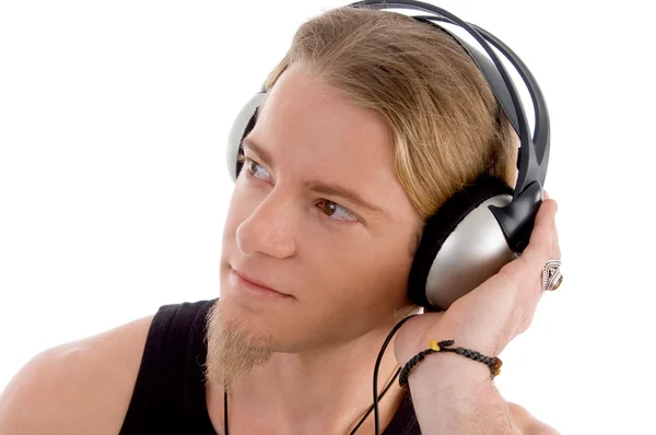 Young male tuned into music Stock Image