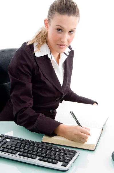Businesswoman working in office Stock Image