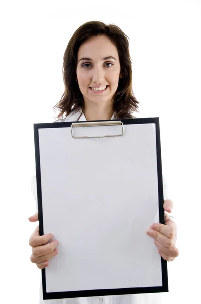 Smart female doctor holding clipboard Royalty Free Stock Images