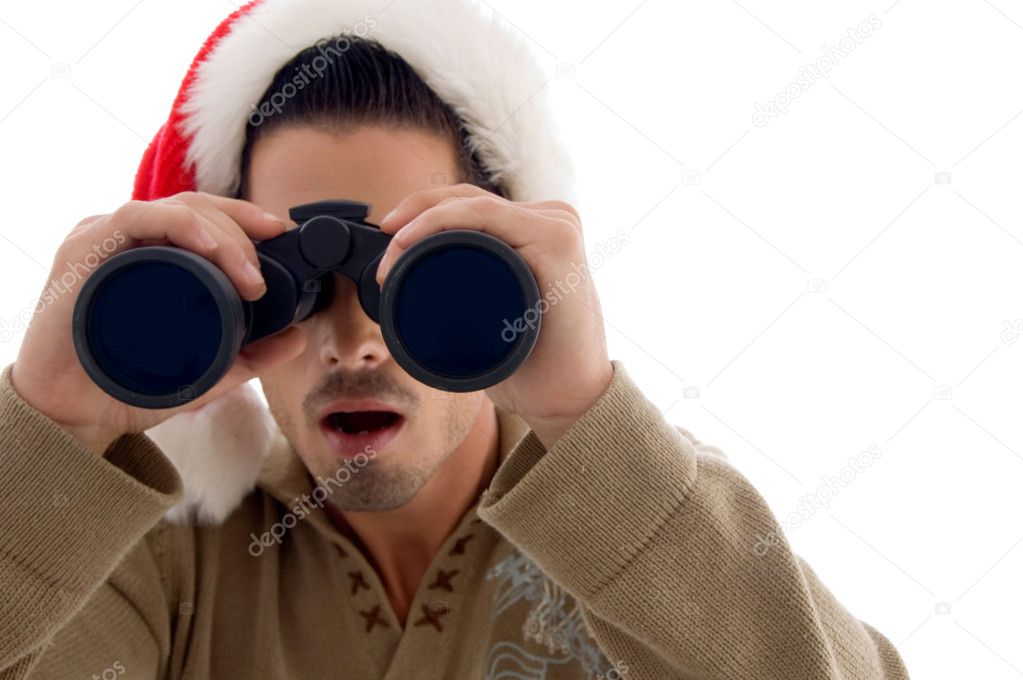 Handsome guy looking into binoculars — Stock Photo © imagerymajestic