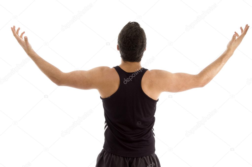 Premium Photo | A young muscular man in an expressive pose pretentious pose  of the hero with outstretched arms beaut...