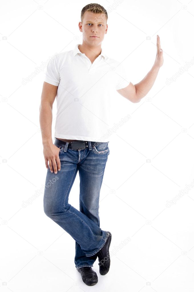 Attractive young man in an elegant shirt in a t-shirt in trendy striped  pants is