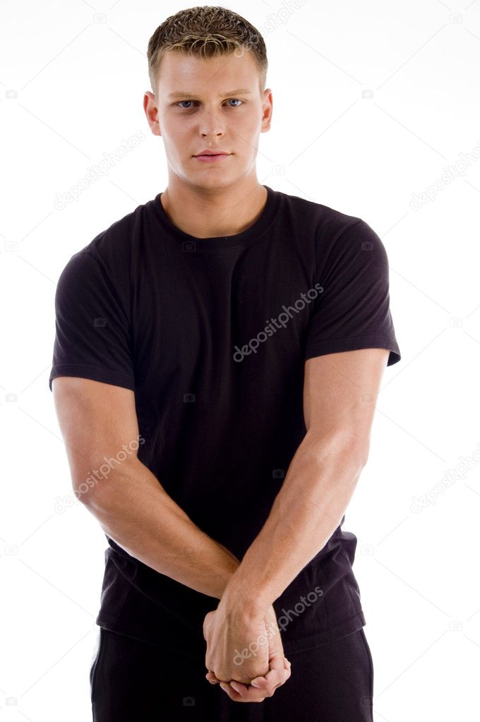 Young muscular man looking at you