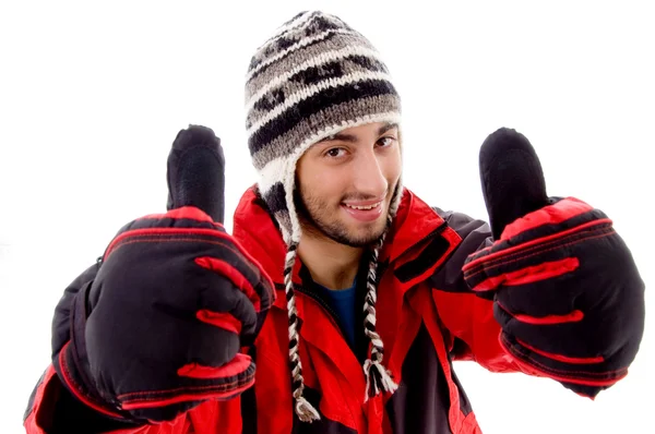 Young man in woolen outfit, thumbs up — Stock Photo, Image
