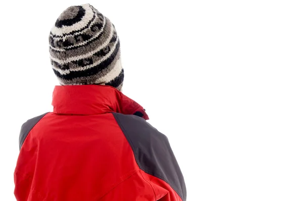 Postura traseira de cara jovem em boné de inverno — Fotografia de Stock