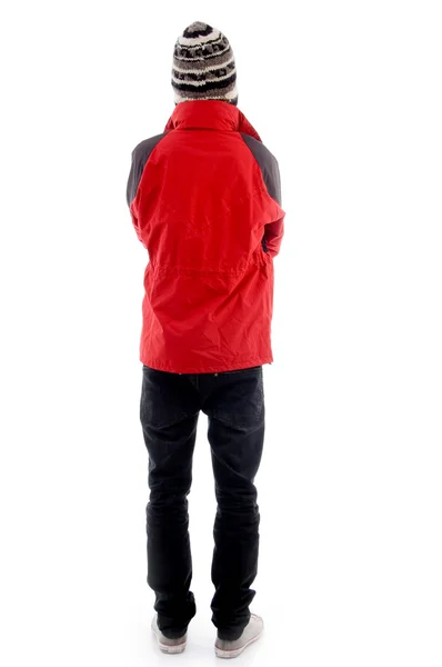 Genç bir adam kış kıyafeti geri poz — Stok fotoğraf