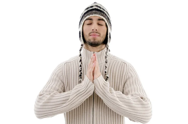 Young guy praying with joined hands — Stock Photo, Image