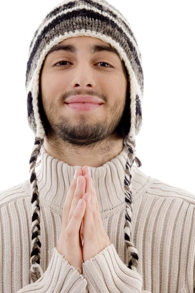 Junger Mann betet mit verbundenen Händen — Stockfoto