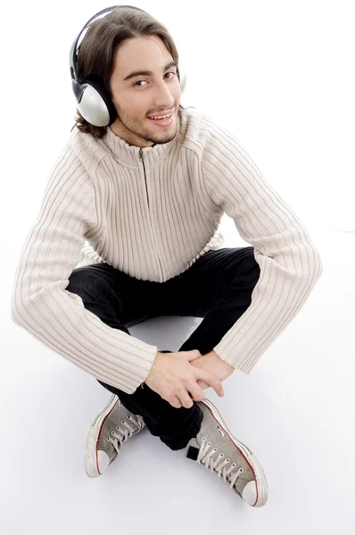 Handsome male listening to music — Stock Photo, Image