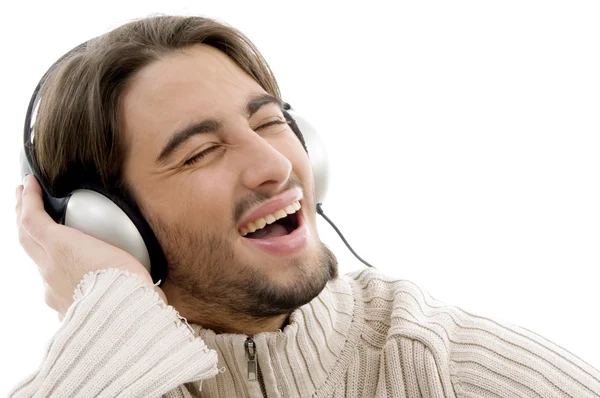 Handsome male listening to music — Stock Photo, Image