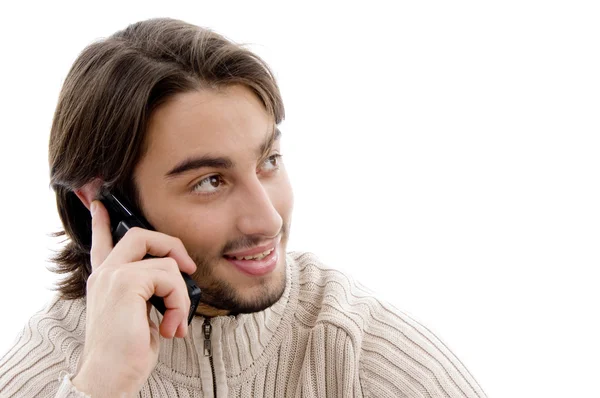 Pohledný muž mluví do mobilního telefonu — Stock fotografie
