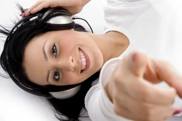Cheerful young woman enjoying music — Stock Photo, Image