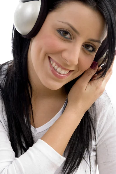 Mosolygós nő fejhallgatóval — Stock Fotó