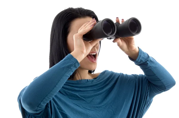 Žena se dívá dalekohledem — Stock fotografie
