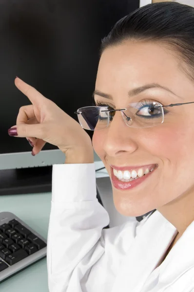 Pointing female doctor at lcd screen — Stock Photo, Image
