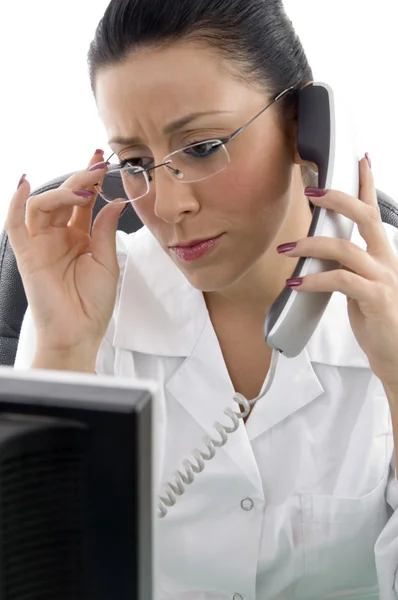Portrait of doctor talking on phone — Stock Photo, Image