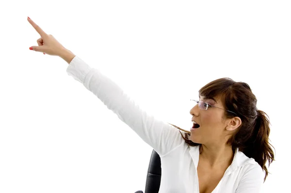 Surprised female executive pointing — Stock Photo, Image