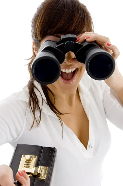 Female viewing through binoculars — Stock Photo, Image