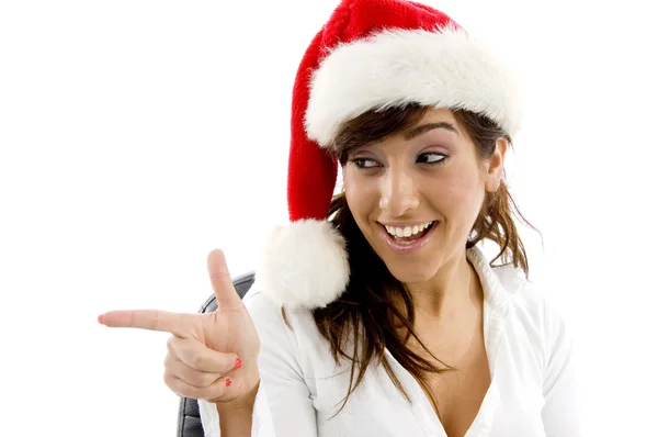 Smiling businesswoman in christmas hat — Stock Photo, Image