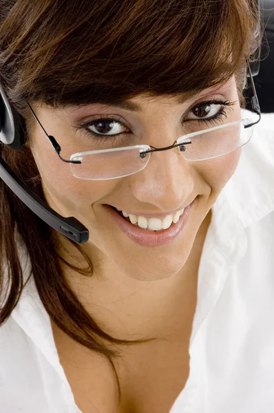 Vrouwelijke uitvoerend met headset — Stockfoto
