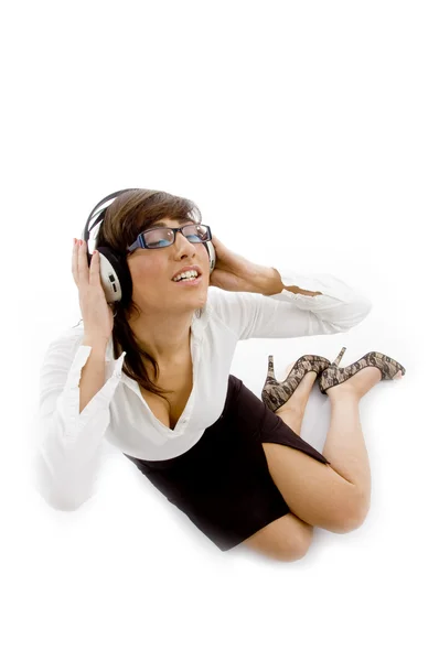 Female attorney tuned to music — Stock Photo, Image