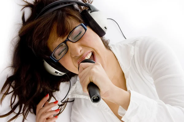 Lady enjoying music and singing — Stock Photo, Image