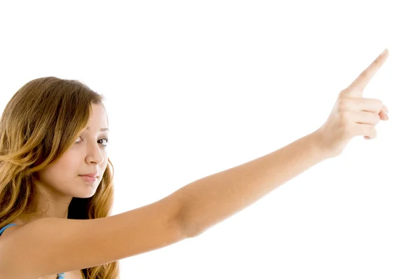 Девочка, показывающая пальцем — стоковое фото