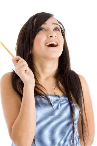 Genç genç kız kalem ile gülüyor — Stok fotoğraf