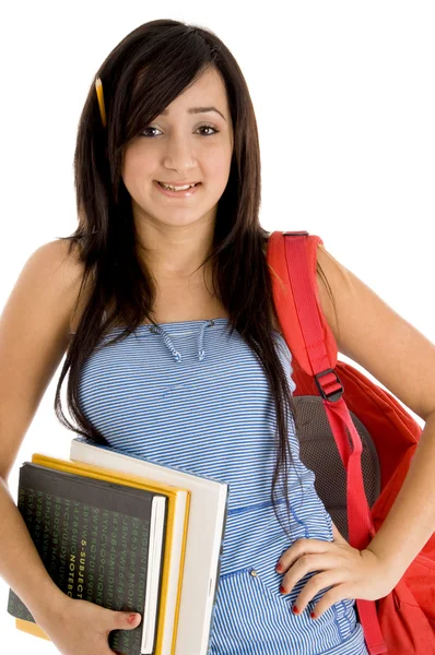 Estudiante posando con bolsa y libros —  Fotos de Stock