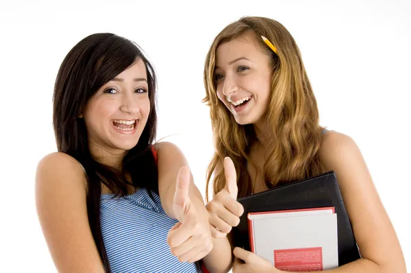 Estudantes do sexo feminino mostrando polegares para cima — Fotografia de Stock