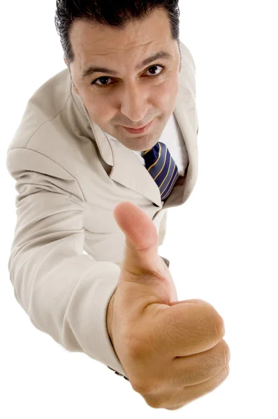Young executive showing thumbs up — Stock Photo, Image