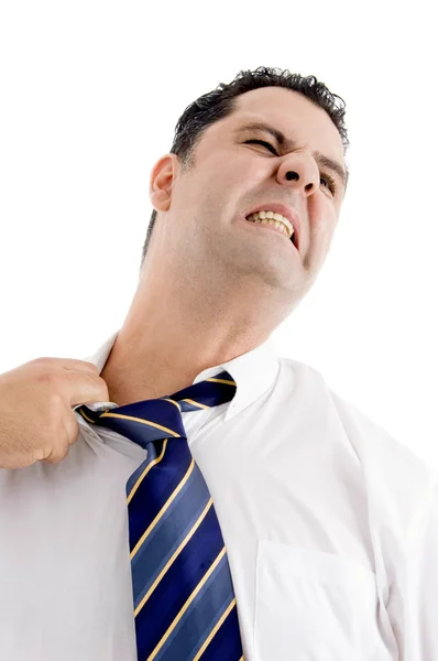 Young businessman itching his neck — Stock Photo, Image