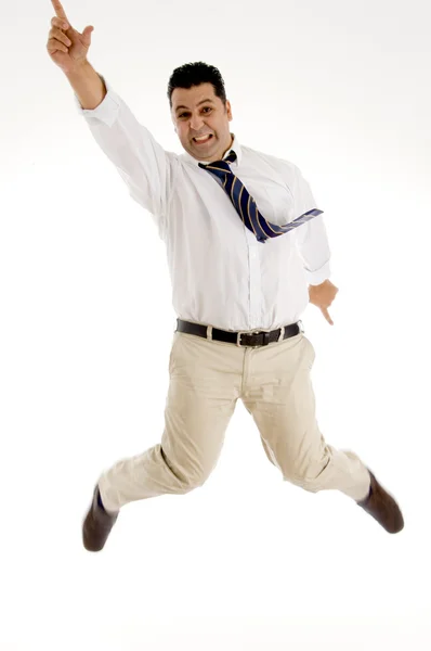 Businessman jumping high in air — Stock Photo, Image