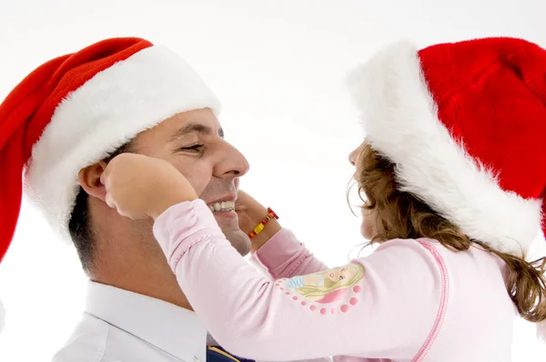 Hija estirando las mejillas del padre — Foto de Stock