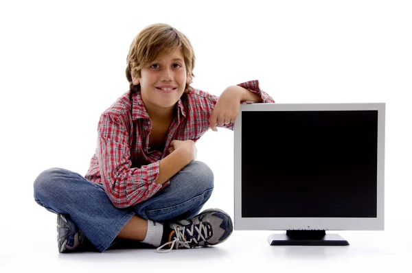 Uśmiechający się młody dzieciak z ekranem lcd — Zdjęcie stockowe