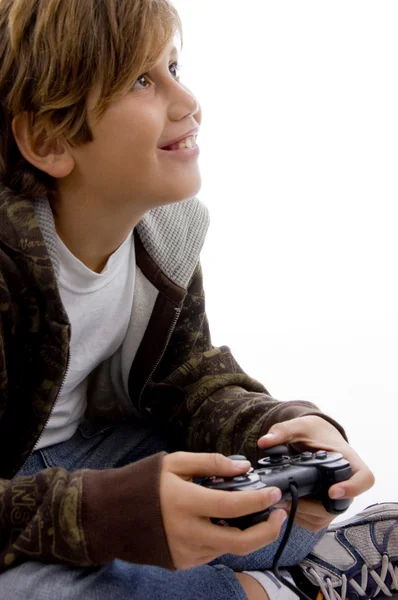 Felice giovane ragazzo godendo videogame — Foto Stock