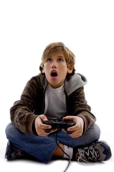 Verbaasd kind spelen van videogames — Stockfoto