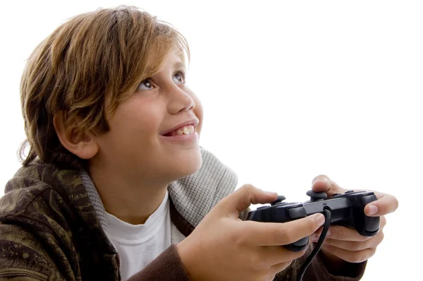 逗乐的男孩玩电子游戏 — 图库照片