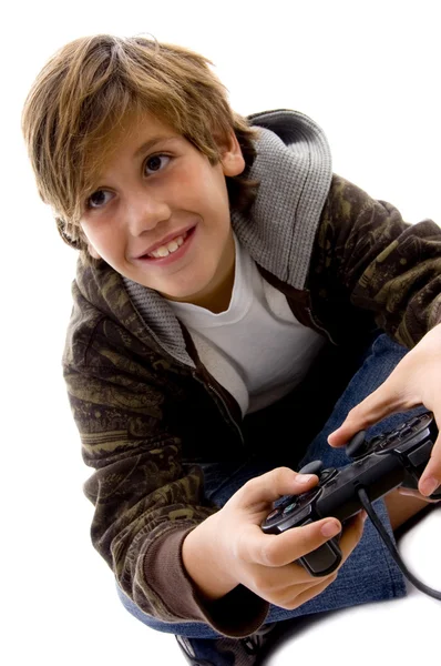 逗乐的男孩玩电子游戏 — 图库照片