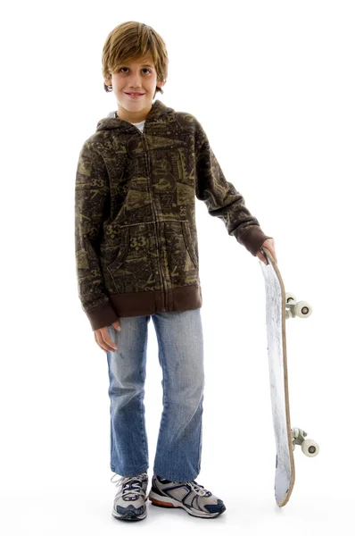 男孩控股滑板和构成 — 图库照片