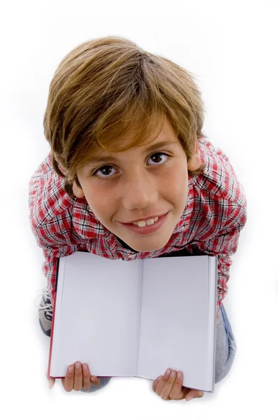 Ariel view of boy showing open book — Stock Photo, Image