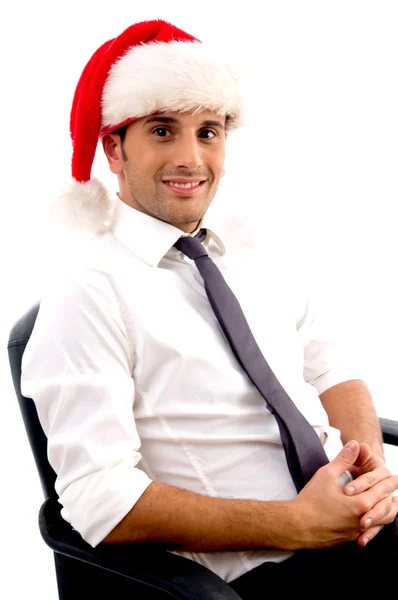 Relaxed businessman in christmas hat — Stock Photo, Image