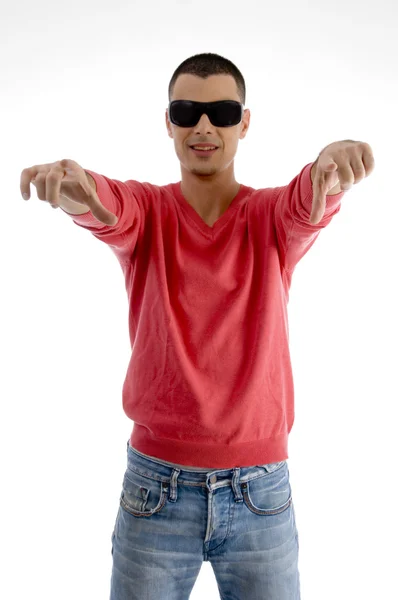Casual male pointing with both hands — Stock Photo, Image