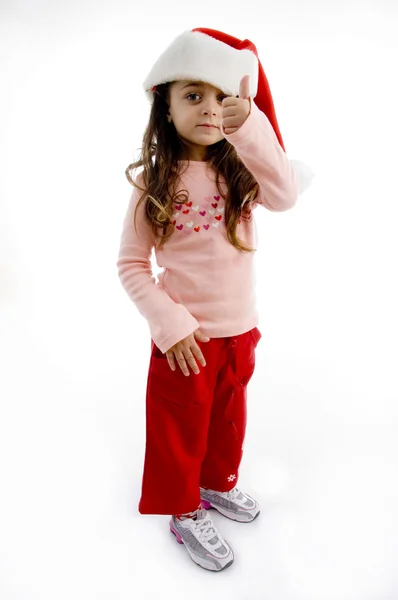 Natal menina mostrando polegares para cima — Fotografia de Stock