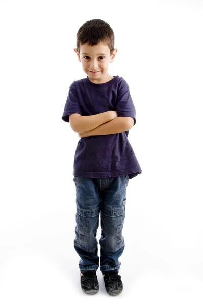 Cute child posing with crossed arms — Stock Photo, Image